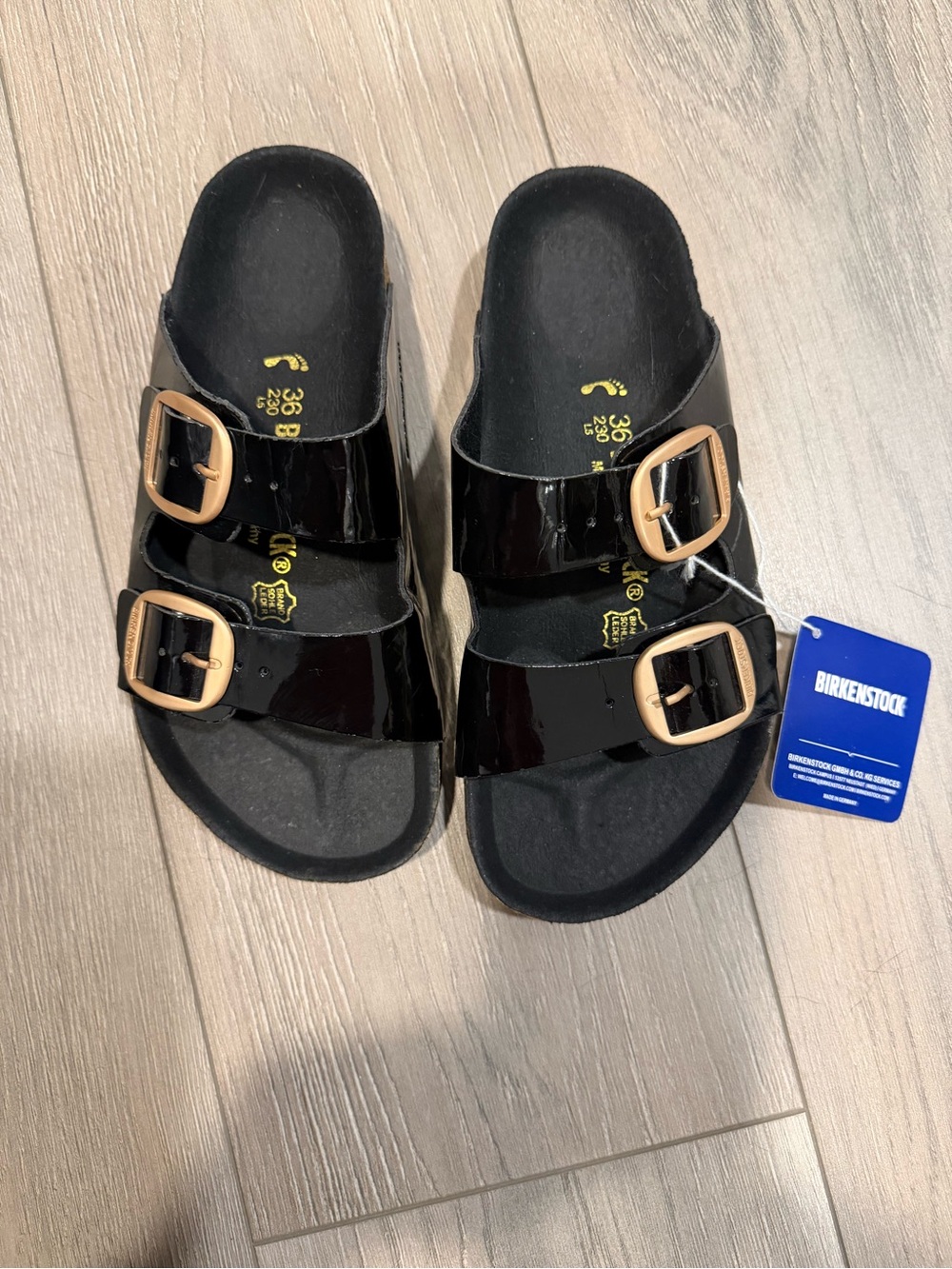 Birkenstock Black Patent Two-Strap Sandals with Gold Buckles